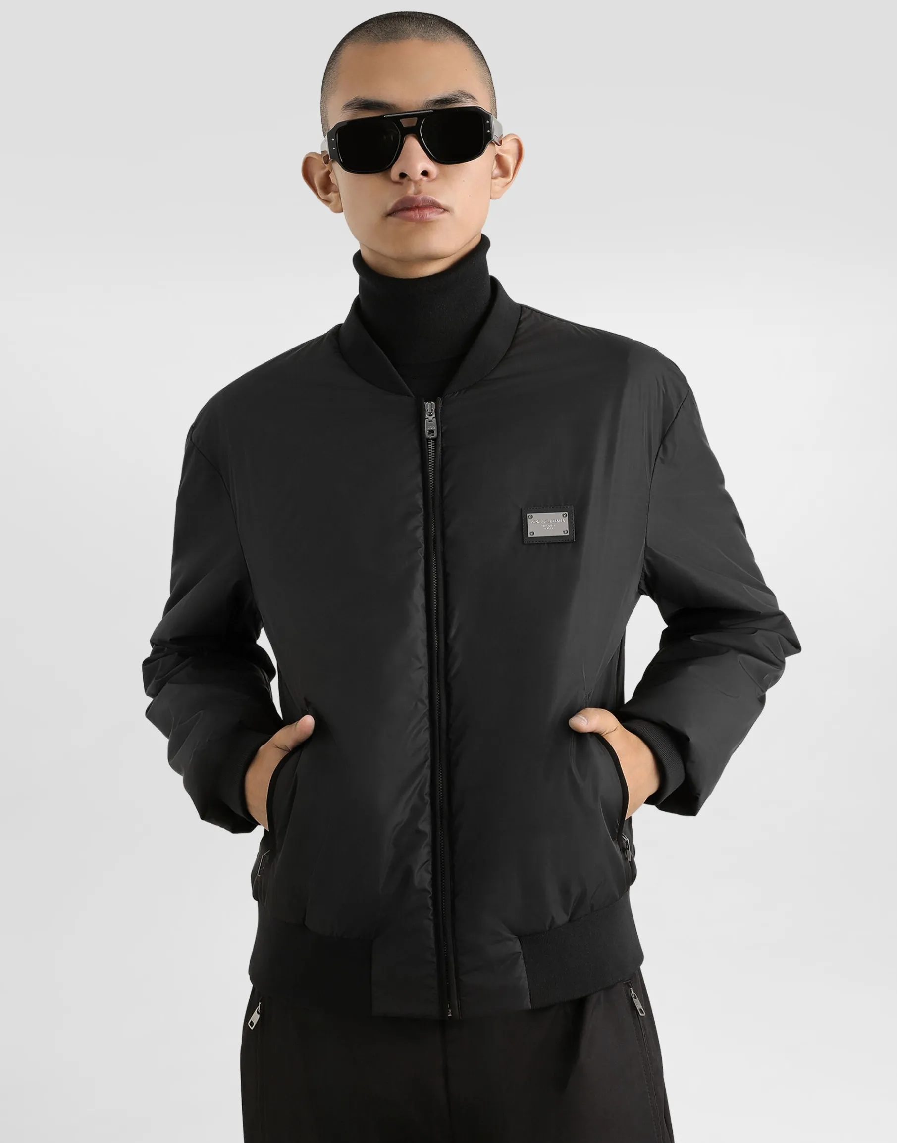 Nylon jacket with branded tag