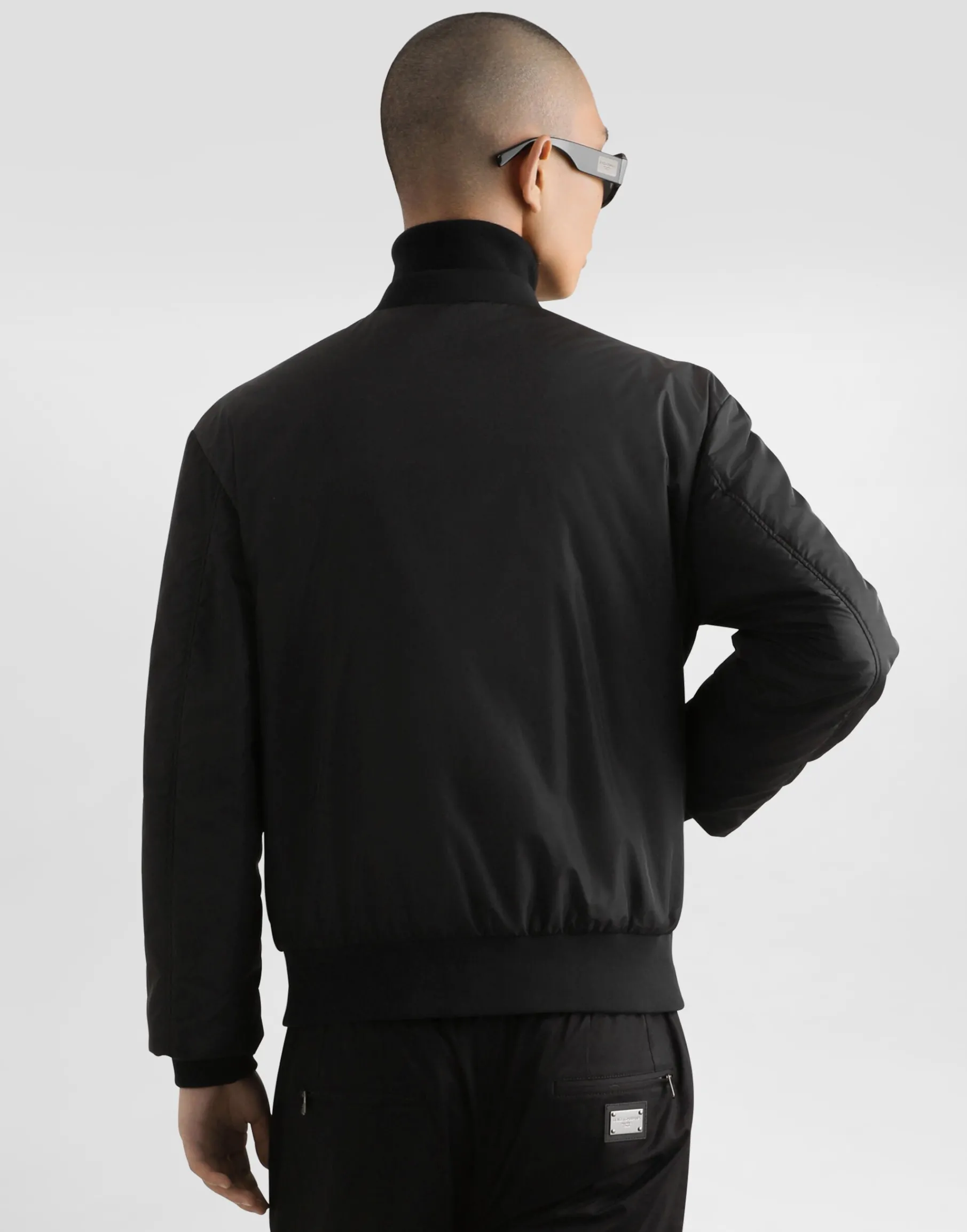 Nylon jacket with branded tag