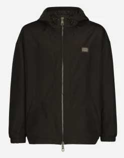 Nylon jacket with hood and branded tag