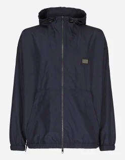 Nylon jacket with hood and branded tag