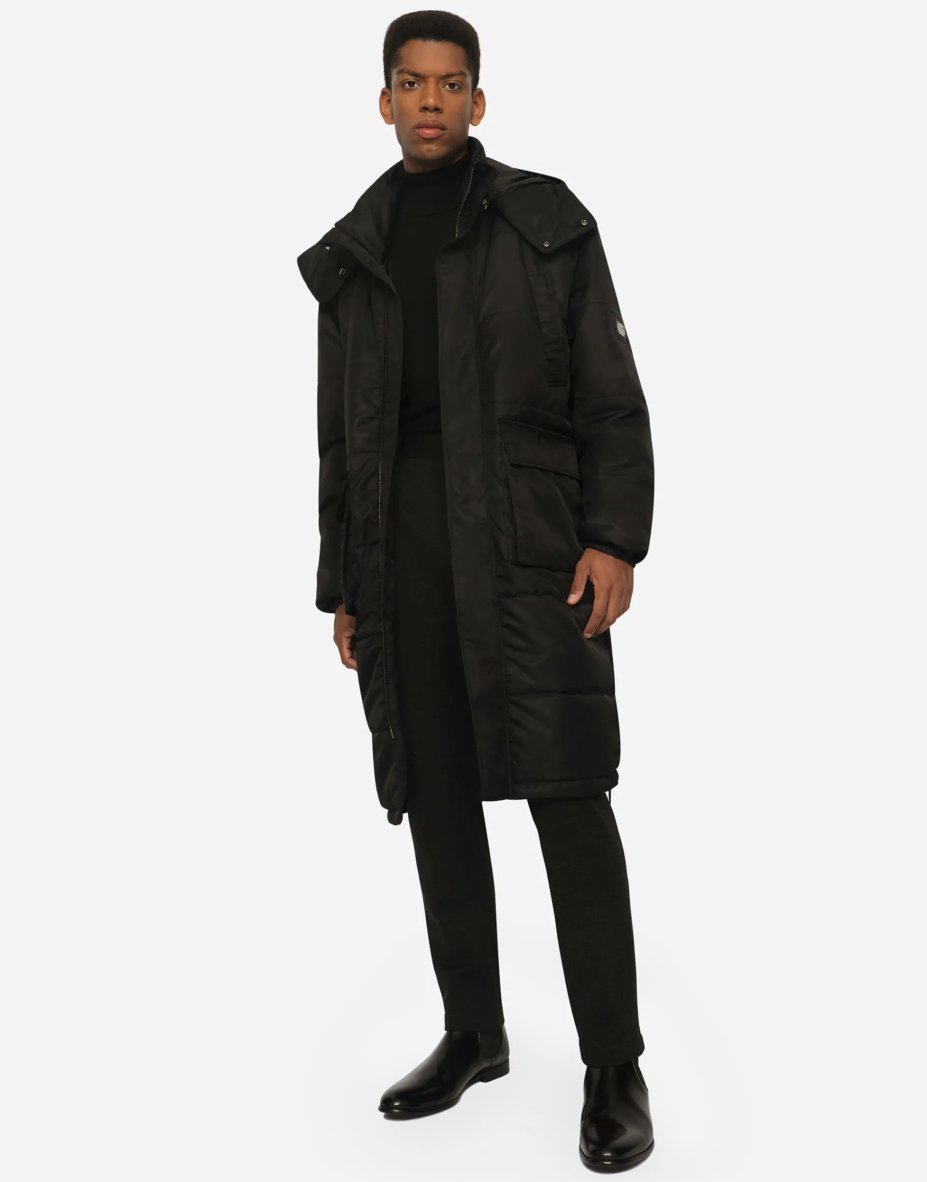 Nylon jacket with hood and branded tag