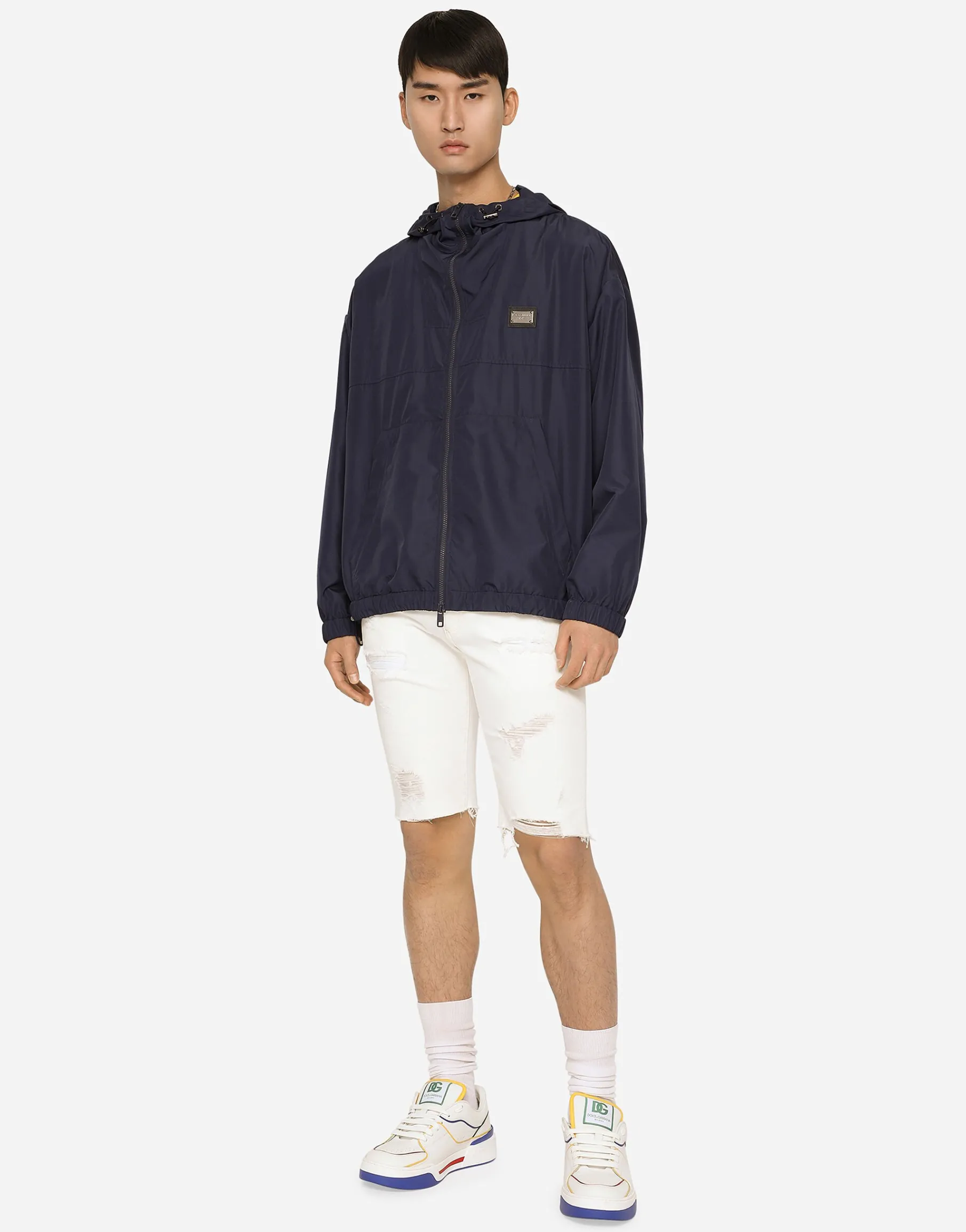 Nylon jacket with hood and branded tag