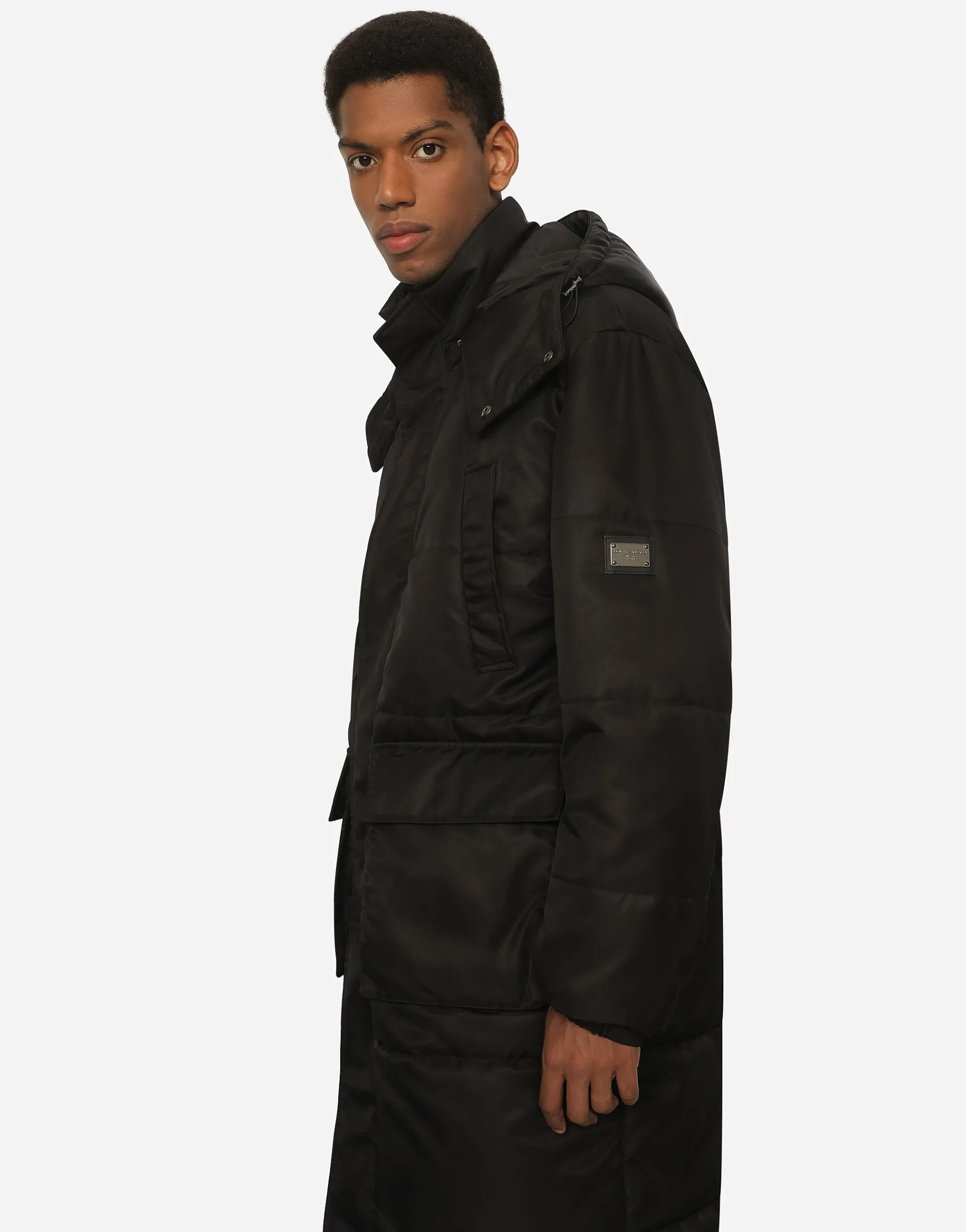 Nylon jacket with hood and branded tag