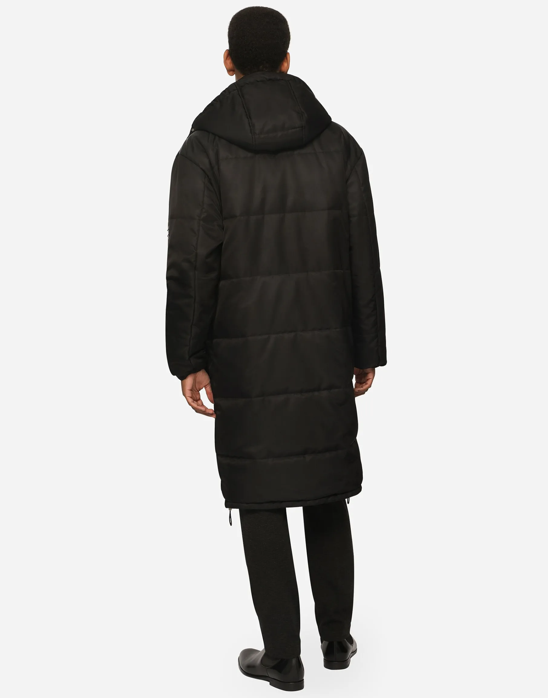 Nylon jacket with hood and branded tag