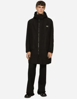 Nylon parka with hood and branded tag