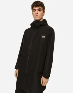 Nylon parka with hood and branded tag