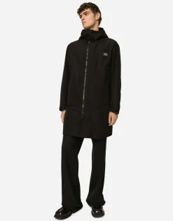Nylon parka with hood and branded tag