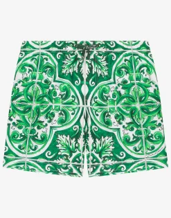 Nylon swim trunks with green majolica print