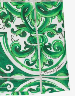 Nylon swim trunks with green majolica print