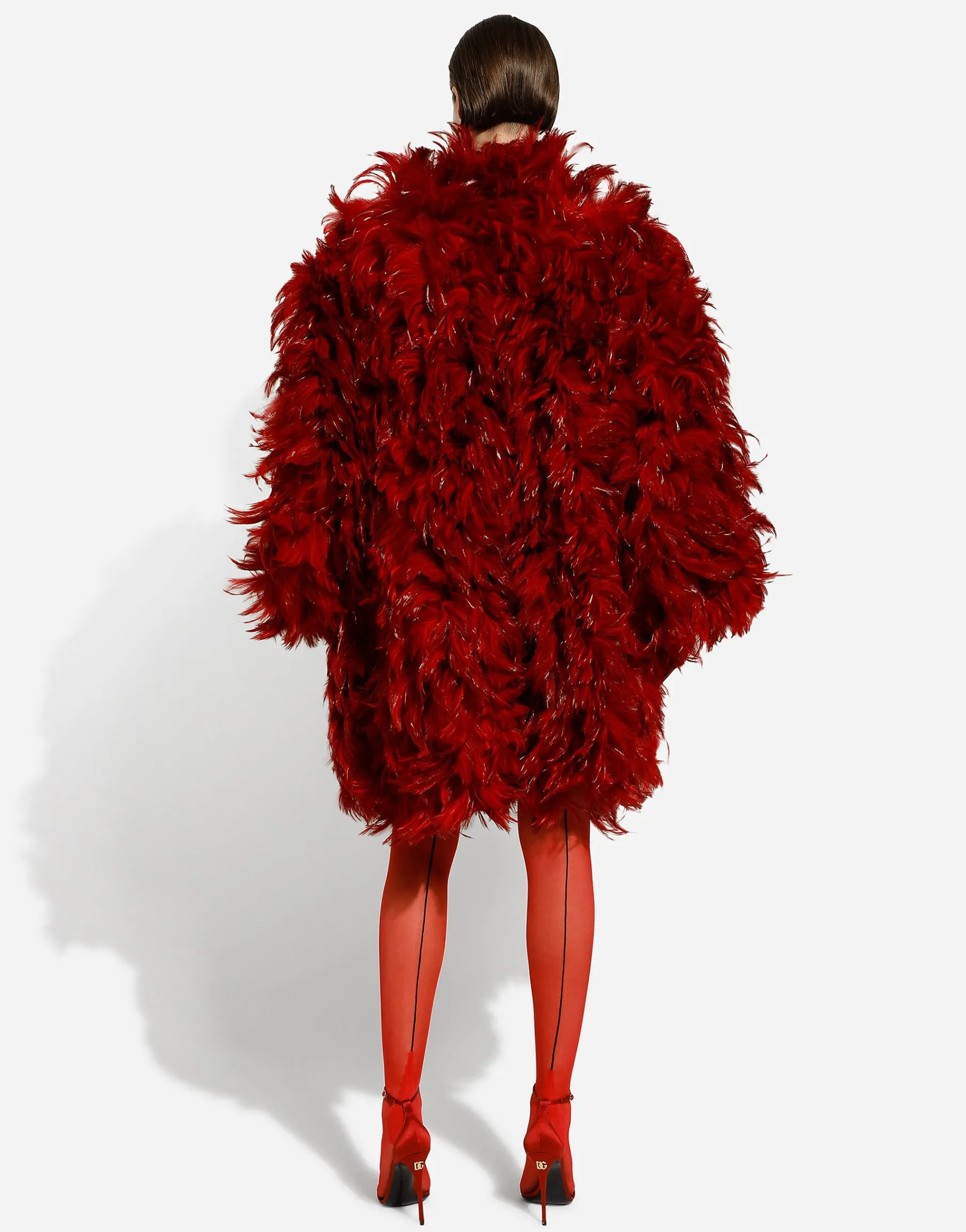 Organza coat with rooster feather embellishment