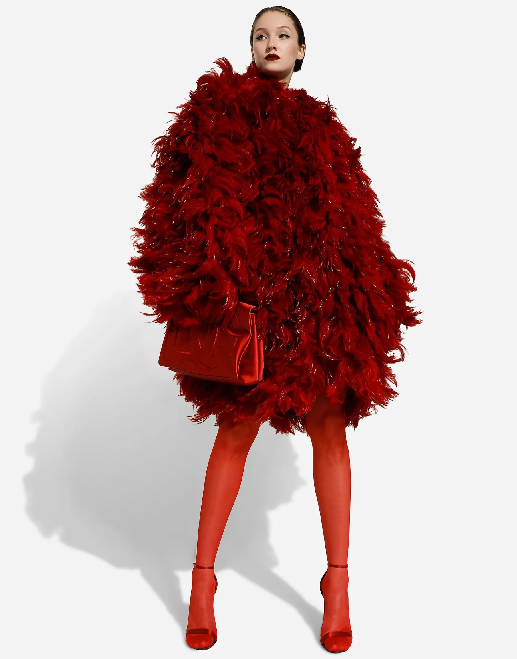 Organza coat with rooster feather embellishment