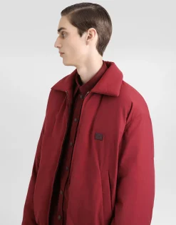 Padded technical fabric jacket with tag
