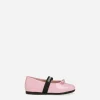 Patent leather ballet flats with bow