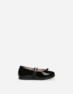 Patent leather ballet flats with bow