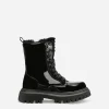 Patent leather combat boots with faux fur lining