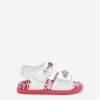 Patent leather sandals with embellishment