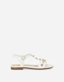 Patent leather sandals with yellow majolica print and Swarovski crystals