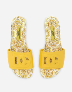 Patent leather sliders with yellow majolica print and cut-out DG detail