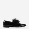 Patent leather slippers with flower appliqué