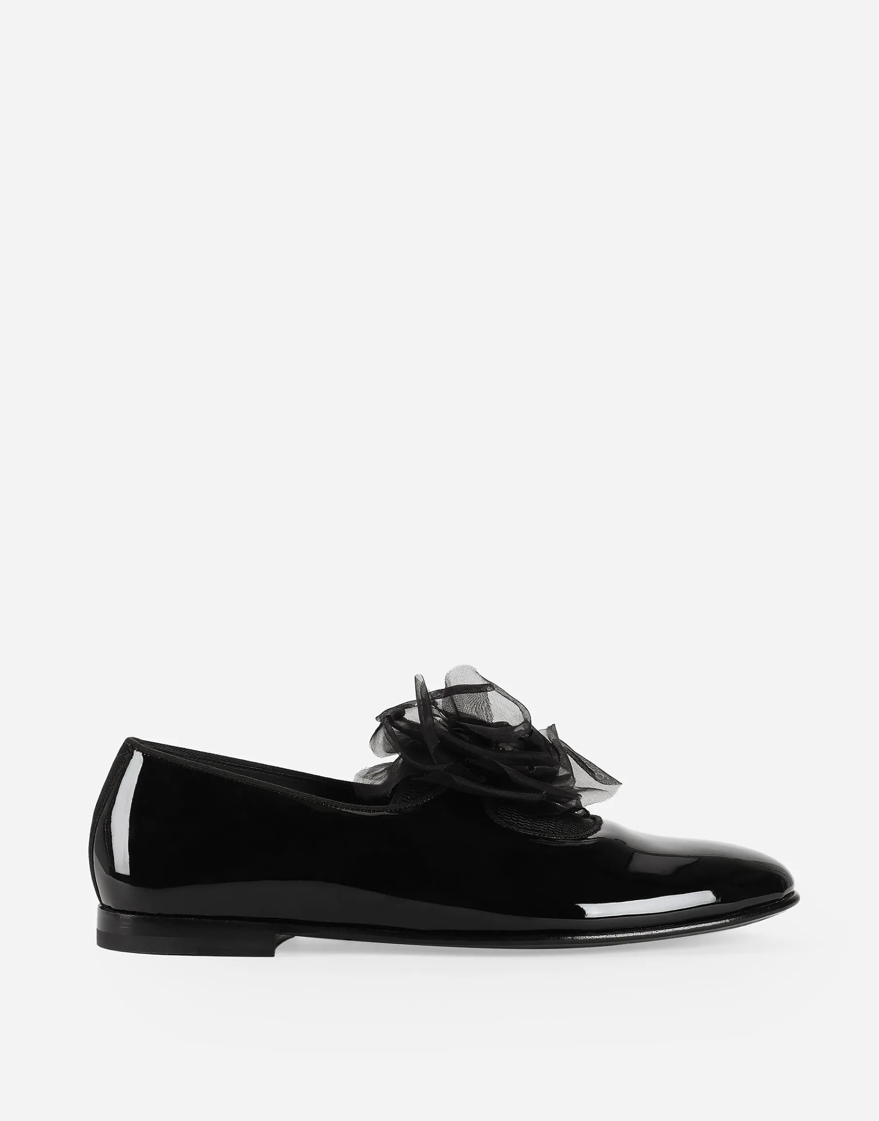Patent leather slippers with flower appliqué