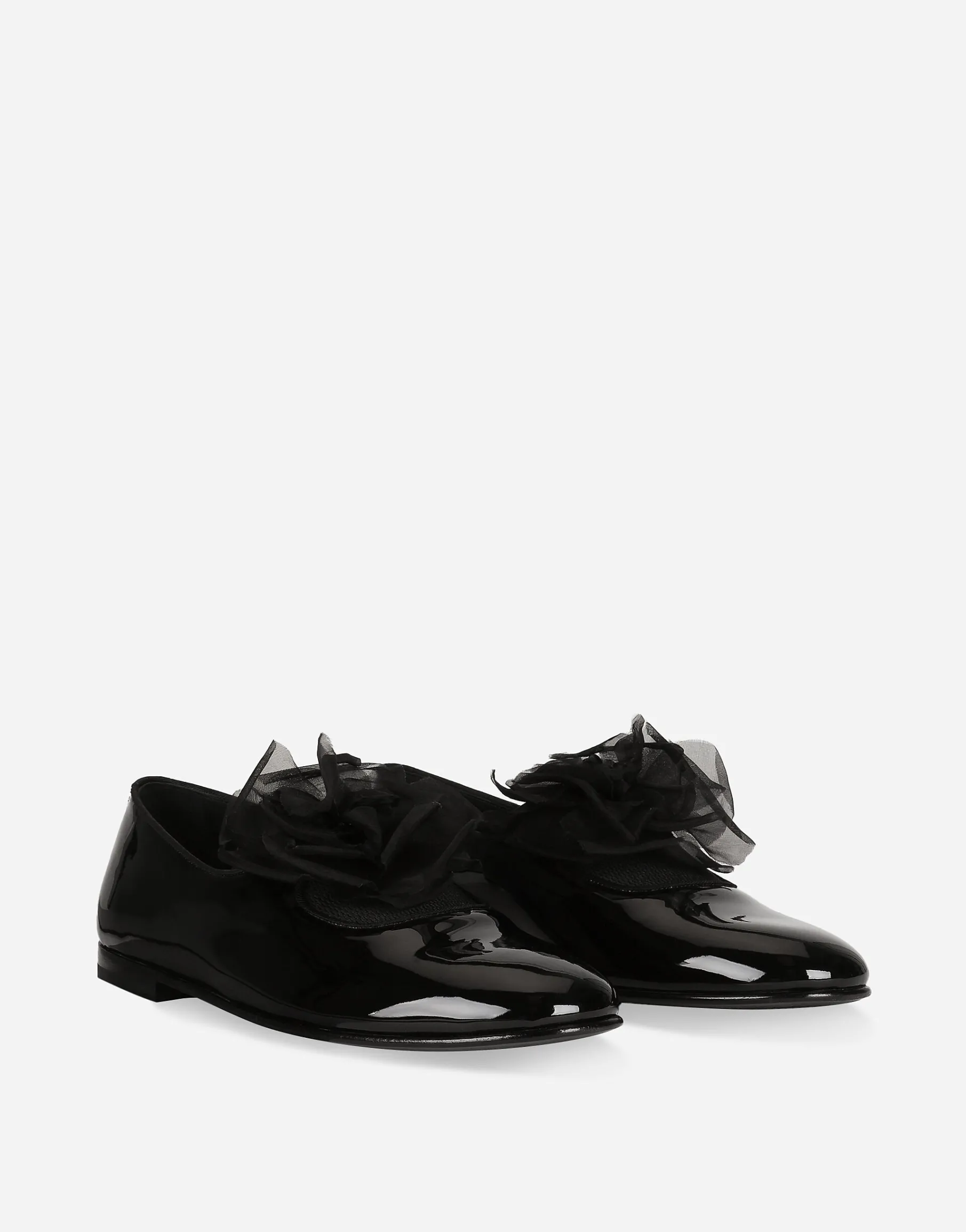 Patent leather slippers with flower appliqué