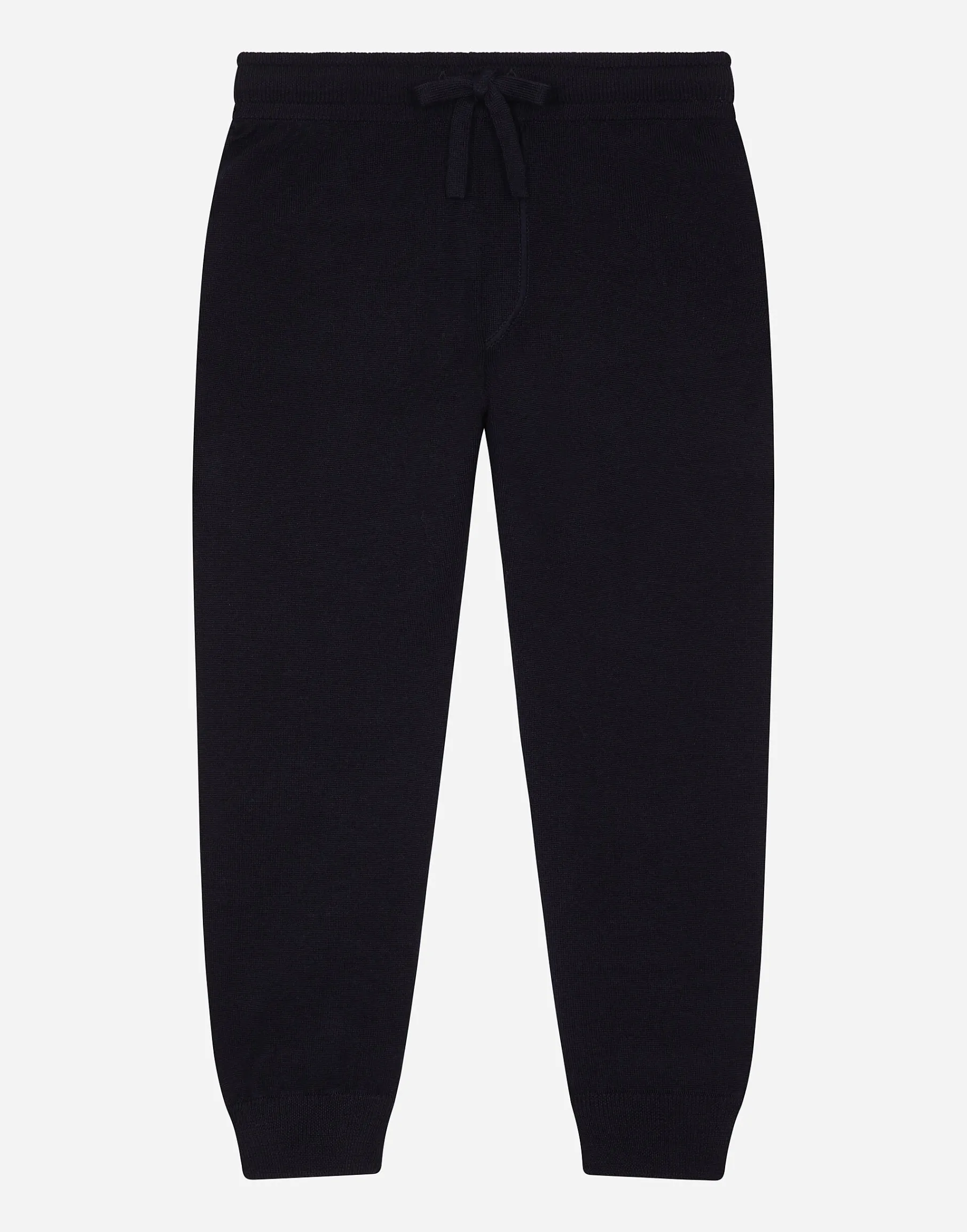 Plain knit jogging pants with logo tag