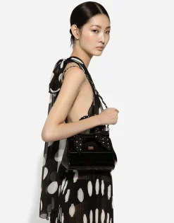 Pleated chiffon calf-length dress with polka-dot print
