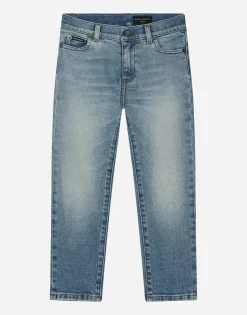 5-pocket treated stretch denim jeans with logo print