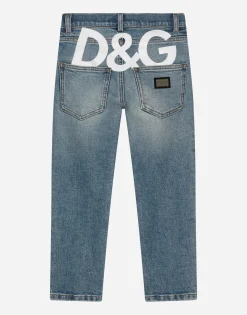 5-pocket treated stretch denim jeans with logo print