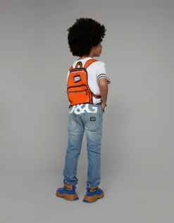 5-pocket treated stretch denim jeans with logo print