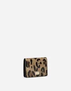 Polished calfskin wallet with leopard print