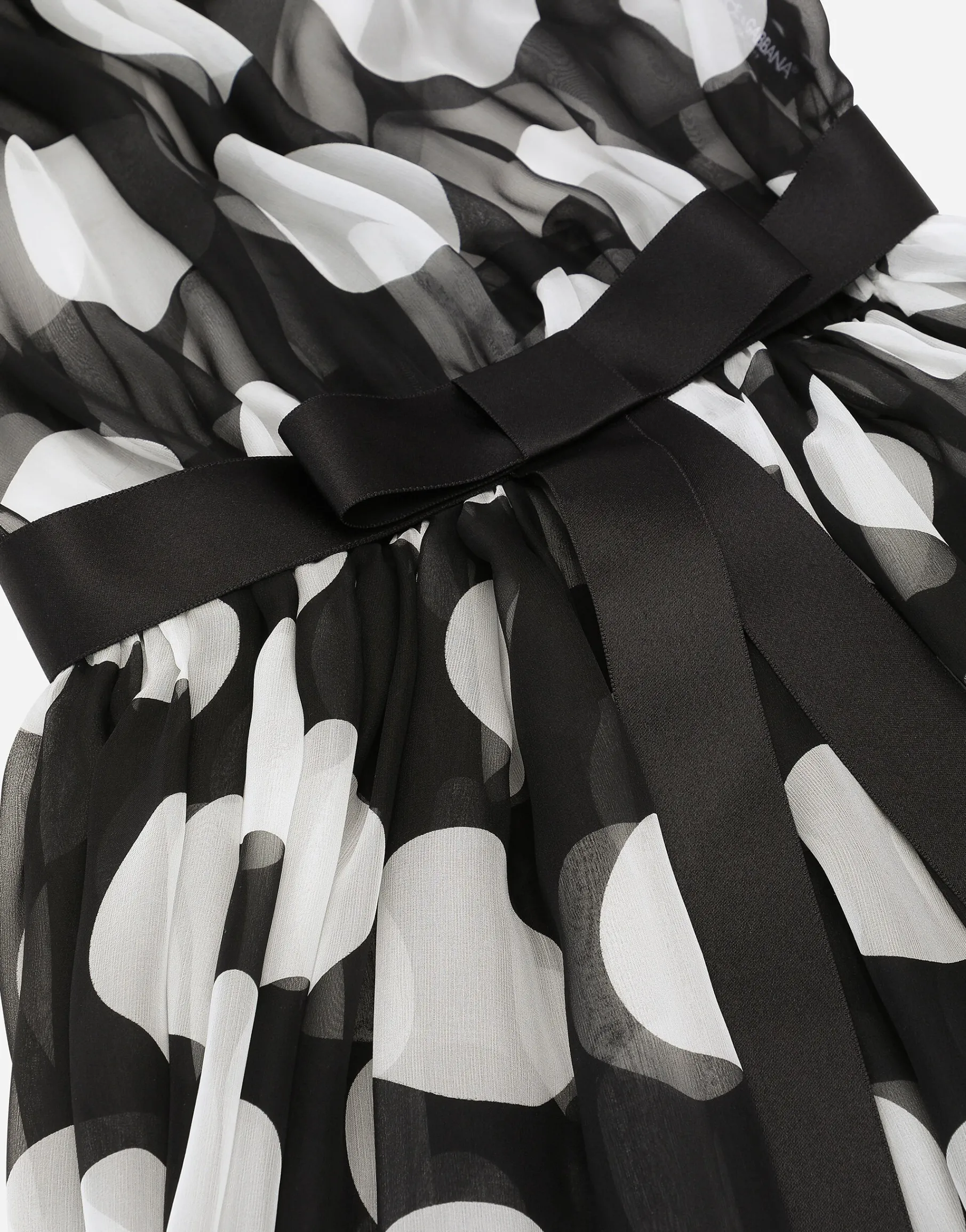 Polka-dot chiffon calf-length dress with piqué details