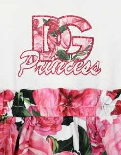 Poplin and jersey dress with rose print over a white background