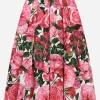 Poplin dress with rose print over a white background