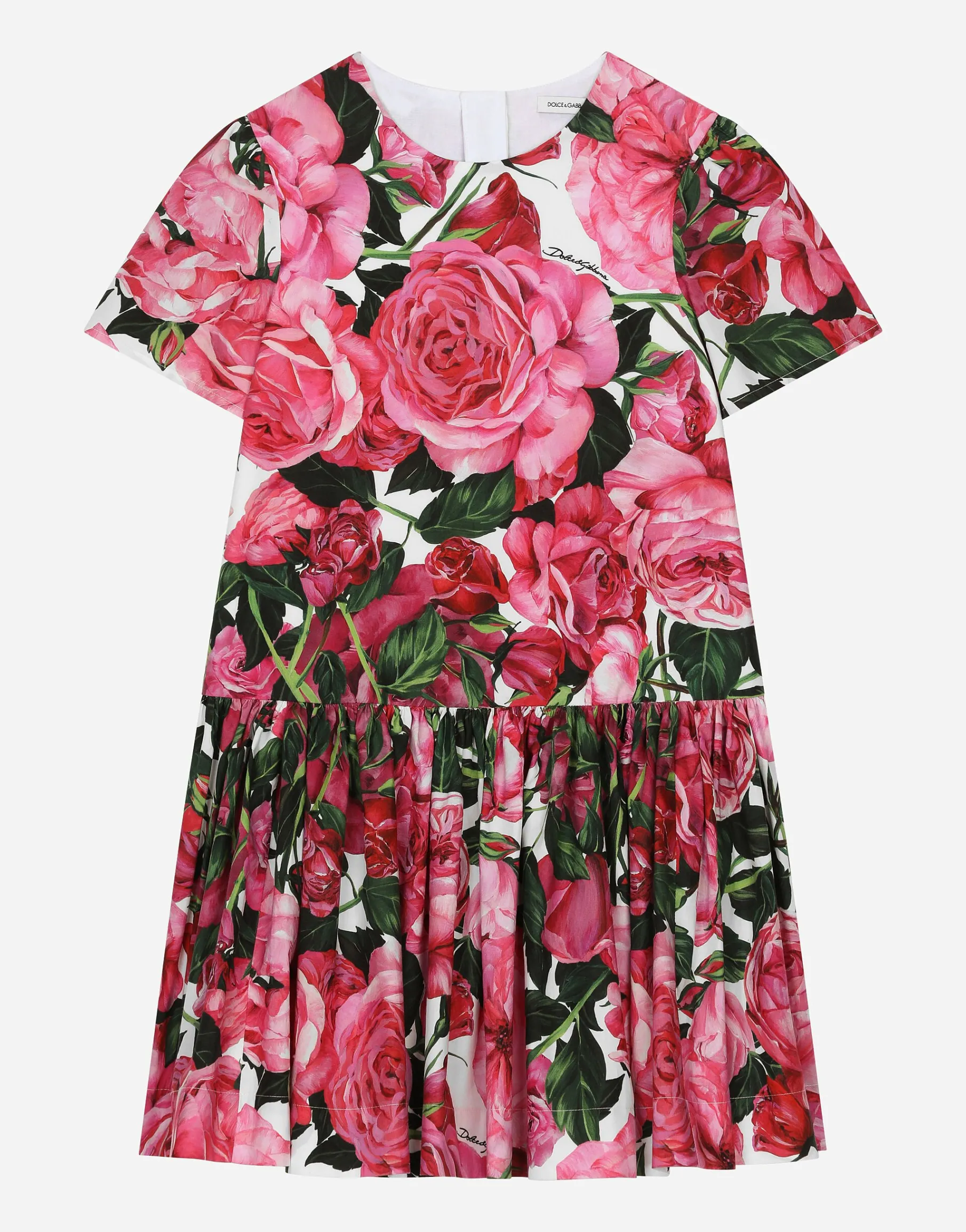 Poplin dress with rose print over a white background