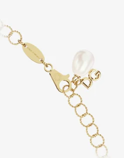 Rainbow alphabet 18 kt yellow gold twisted wire chain bracelet