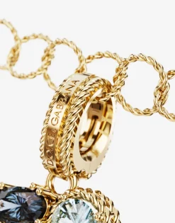 Rainbow alphabet O 18 kt yellow gold charm with multicolor fine gems