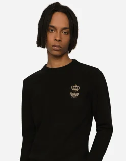 Round-neck wool sweater with embroidery