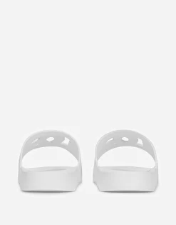 Rubber beachwear sliders with DG logo