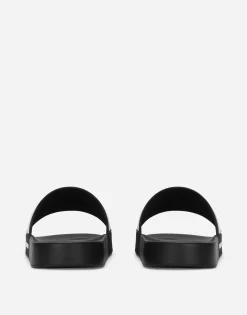 Rubber beachwear sliders with DG logo