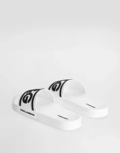 Rubber beachwear sliders with DG logo