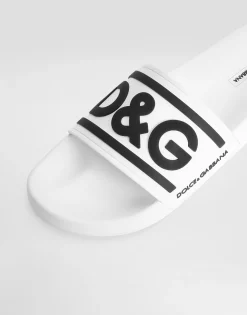 Rubber beachwear sliders with DG logo