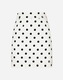 Short charmeuse skirt with polka-dot print