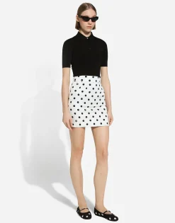 Short charmeuse skirt with polka-dot print