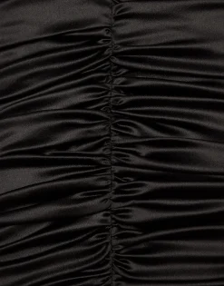 Short draped satin skirt with side bow