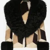 Short heavy jacket in sheepskin patchwork