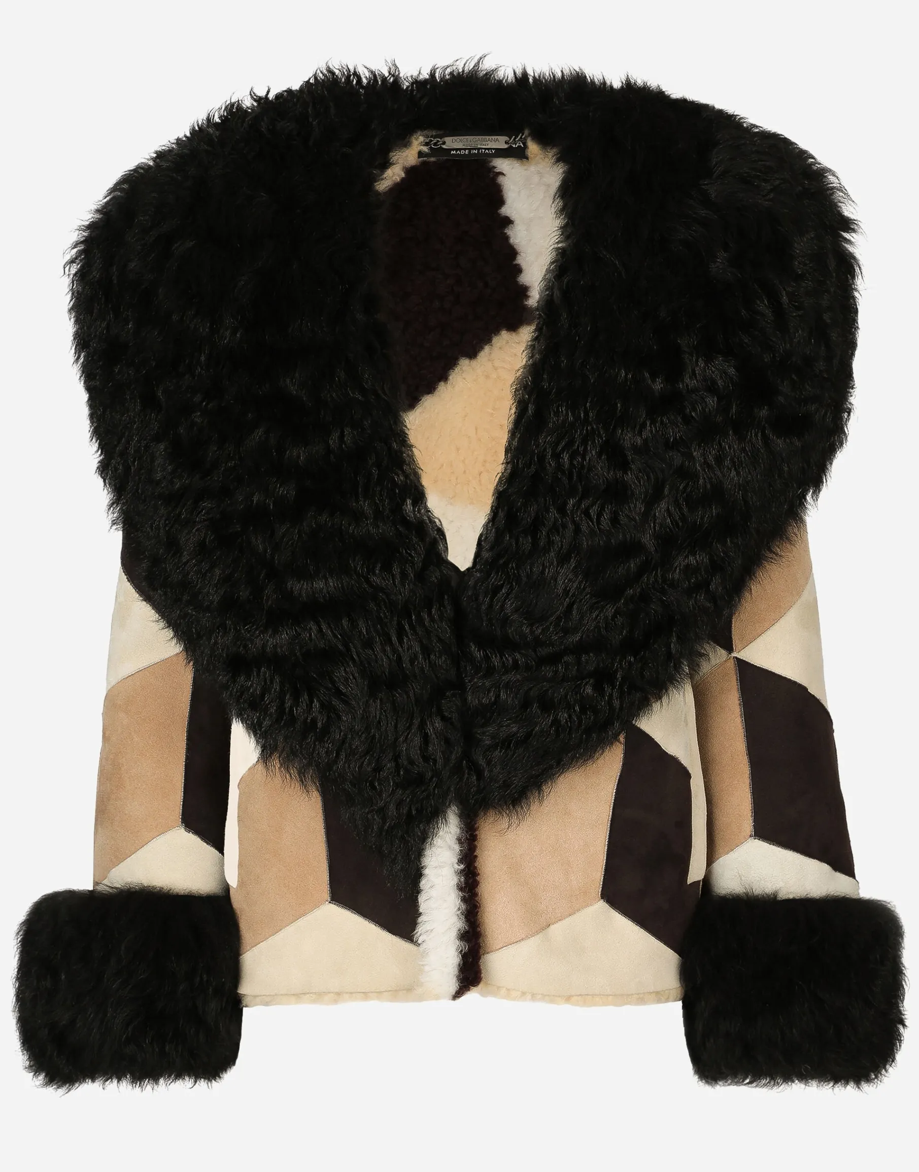 Short heavy jacket in sheepskin patchwork