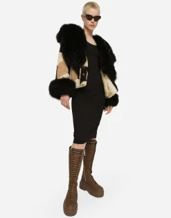 Short heavy jacket in sheepskin patchwork