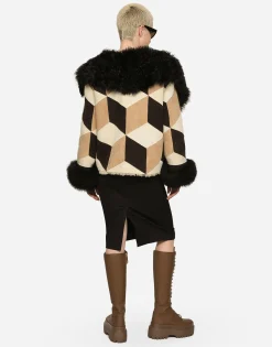 Short heavy jacket in sheepskin patchwork
