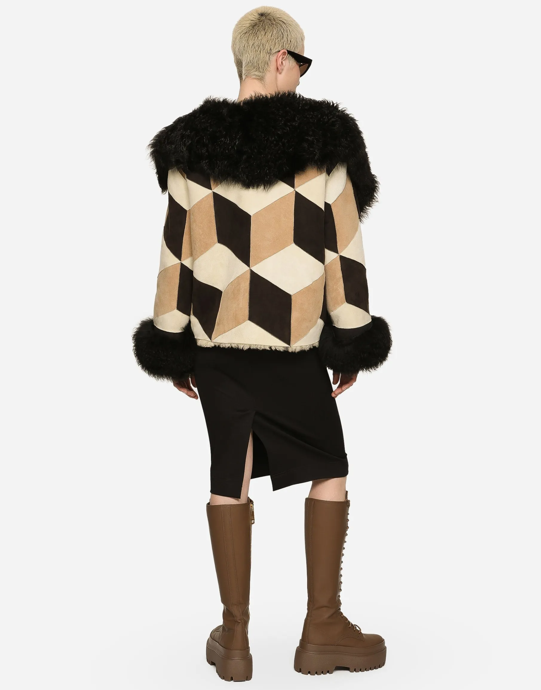 Short heavy jacket in sheepskin patchwork
